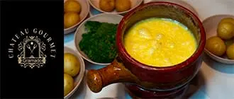 Chateau Gourmet em Gramado: Fondue com Cupom de Desconto do Tchê Ofertas.